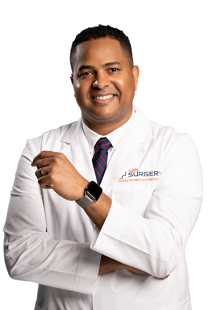 Dr. Abel Bello in his MIB Surgery white coat